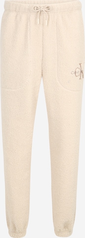 Calvin Klein Jeans - Tapered Calças em bege: frente