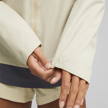 PUMA Athletic Jacket in Beige