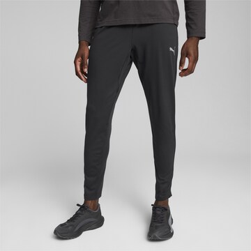 Effilé Pantalon de sport PUMA en noir : devant