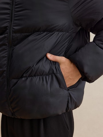 DAN FOX APPAREL Zimní bunda 'John ' – černá