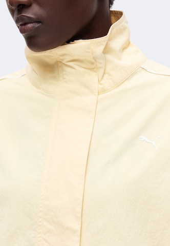 PUMA Αθλητικό μπουφάν 'Tropical Speed' σε κίτρινο
