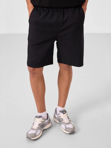 Regular Pantalon chino Tommy Life en noir : devant