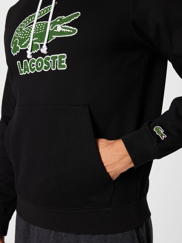 Sweat-shirt LACOSTE en noir