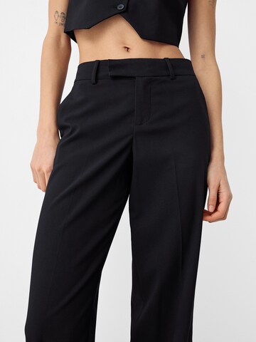 Wide leg Pantaloni con piega frontale di Bershka in nero