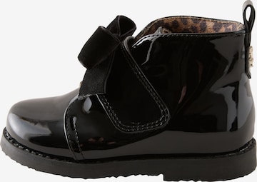 Next - Botas en negro: frente