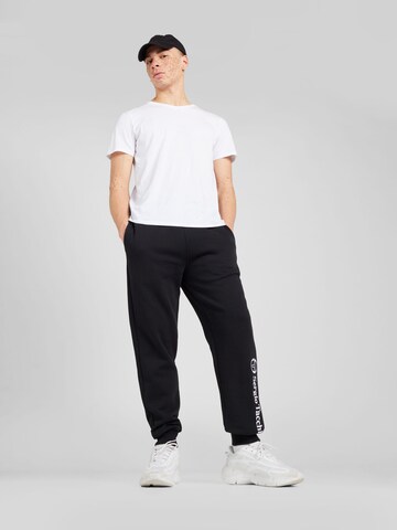 Sergio Tacchini Tapered Housut 'HERITAGE' värissä musta