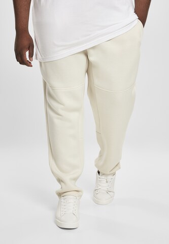 Urban Classics Regular Trousers 'Cut and Sew' in Beige: front