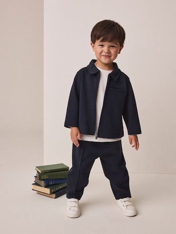 Set Next en bleu