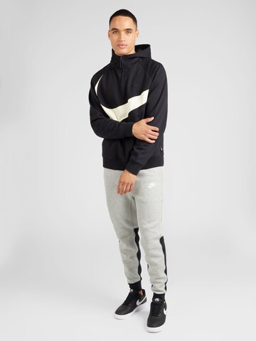 Nike Sportswear Tapered Παντελόνι 'TECH FLEECE' σε γκρι