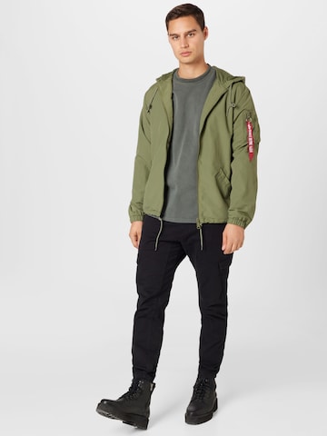 ALPHA INDUSTRIES Prehodna jakna 'Expedition' | zelena barva