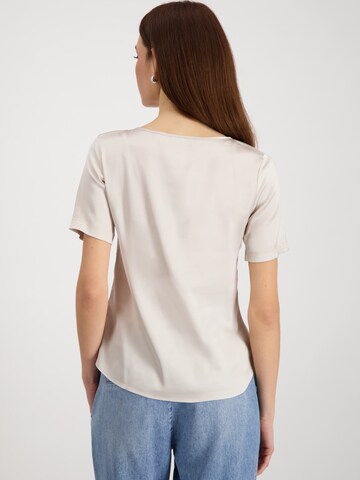Camicia da donna di monari in beige
