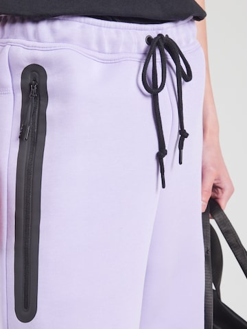 Nike Sportswear Voľný strih Nohavice 'TCH FLC' - Fialová
