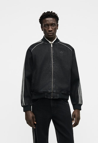 ADIDAS ORIGINALSPrijelazna jakna 'SST TT' - crna boja: prednji dio
