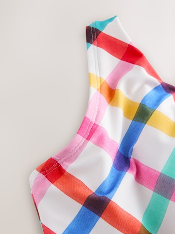 Next Сутиен със смаляващ ефект Горнище на бански в бяло