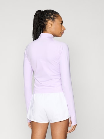 Tricou funcțional 'SWIFT' de la NIKE pe mov