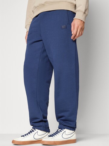 ALPHA INDUSTRIES Tapered Trousers 'Essentials' in Blue