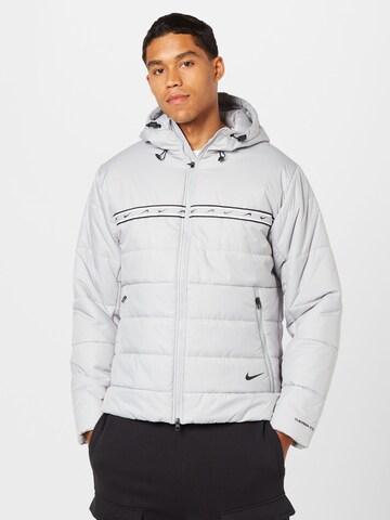 Nike Sportswear Between-season jacket 'REPEAT' in Grey: front