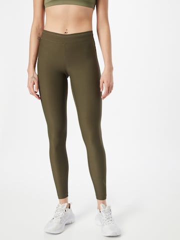 Casall Skinny Workout Pants in Green: front