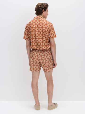 Shorts de bain Marks & Spencer en beige