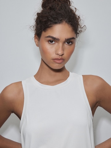 Next Спортивный топ в Бежевый