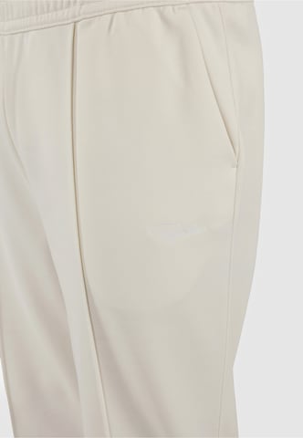 regular Pantaloni sportivi 'Motus' di Pegador in bianco