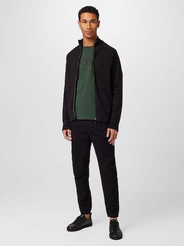 Calvin Klein Jeans Tapered Housut värissä musta