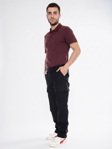 Carhartt WIP Baggy Cargobroek 'Regular Cargo Pant Black /rinsed' in Zwart: voorkant