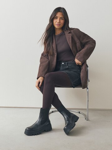 Next - Leotardos en marrón