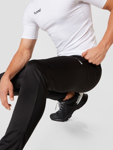 Regular Pantalon de sport Hummel en noir