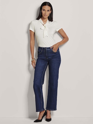 MADELEINE Slimfit Jeans in Blauw