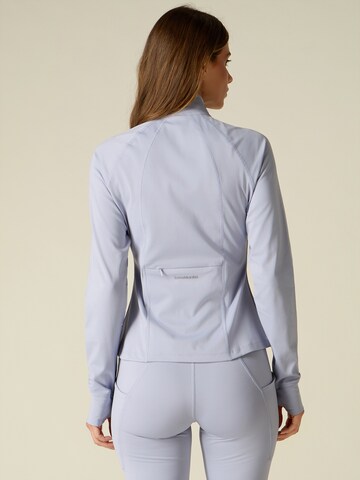 Veste de survêtement oltre en bleu