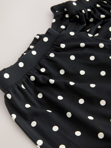 juoda Next Siaurėjantis Hareminės kelnės