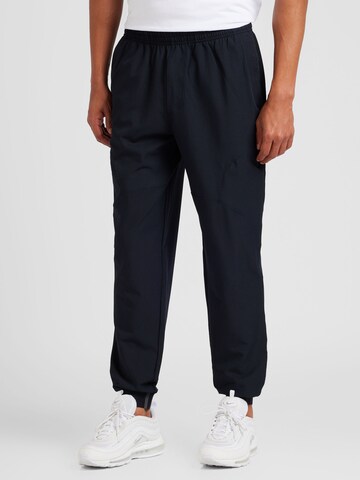 UNDER ARMOUR Tapered Sports trousers 'Unstoppable' in Black: front