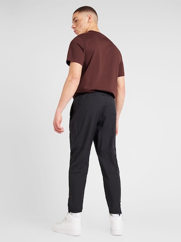 NIKE Tapered Sportbroek 'CHALLENGER' in Zwart