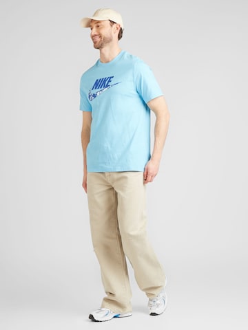 Nike Sportswear T-shirt 'FUTURA' i blå