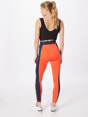 PUMA Skinny Workout Pants in Orange