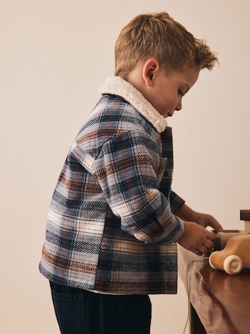 Next Tussenjas in Blauw