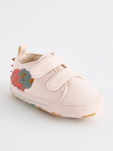 Neonato di Next in beige