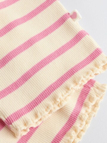 Set Next en rose