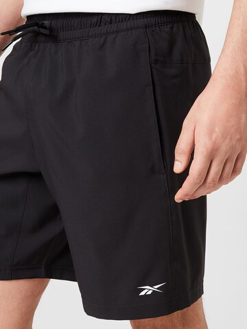 Regular Pantaloni sport 'Workout Ready' de la Reebok pe negru