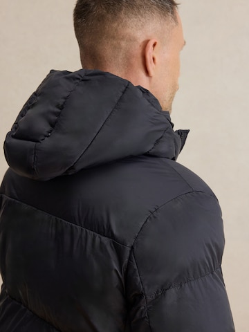 DAN FOX APPAREL Zimní bunda 'John ' – černá