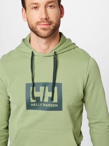 HELLY HANSEN Sweatshirt 'TOKYO' in Groen