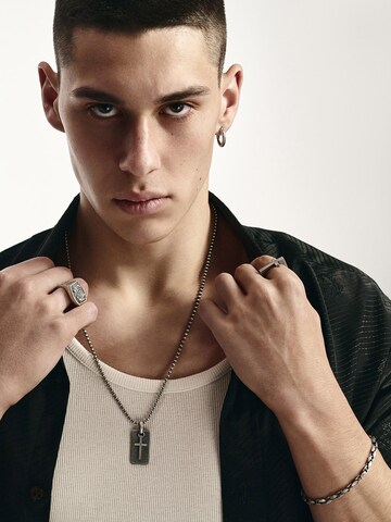 Orecchino 'BONE' di REYTEL in argento