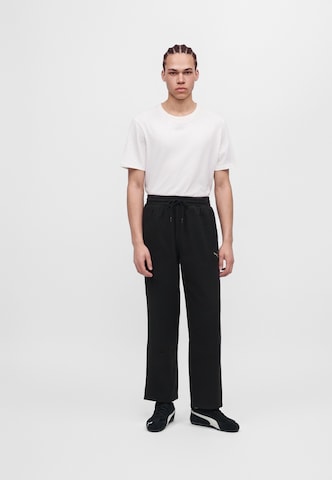 PUMA Loose fit Trousers 'Essential' in Black