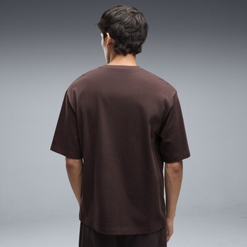 PUMA Shirt in Bruin