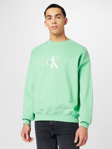 Calvin Klein Jeans Суичър в зелено: отпред