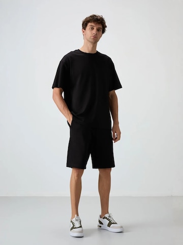 Regular Pantalon Tommy Life en noir