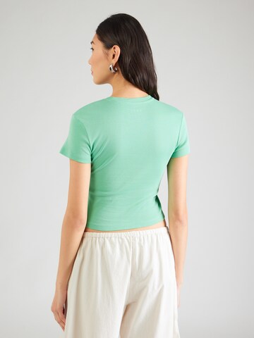 ROXY T-shirt 'BEACH LOVE' i grön