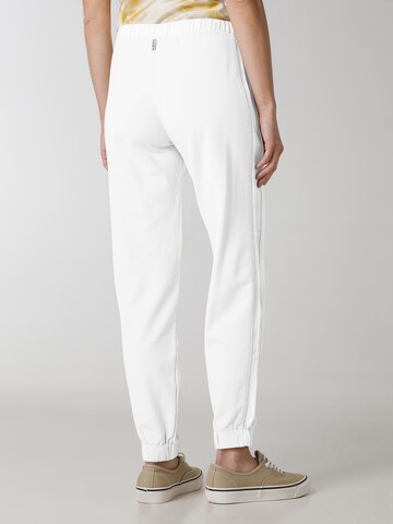 Tapered Pantaloni sportivi di DEHA in bianco
