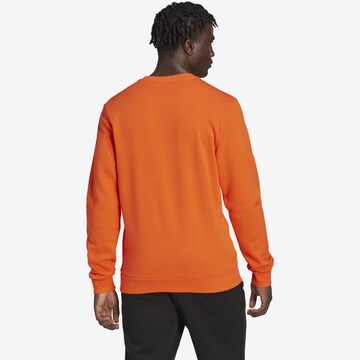 ADIDAS SPORTSWEAR Sportsweatshirt 'Essentials' in Oranje